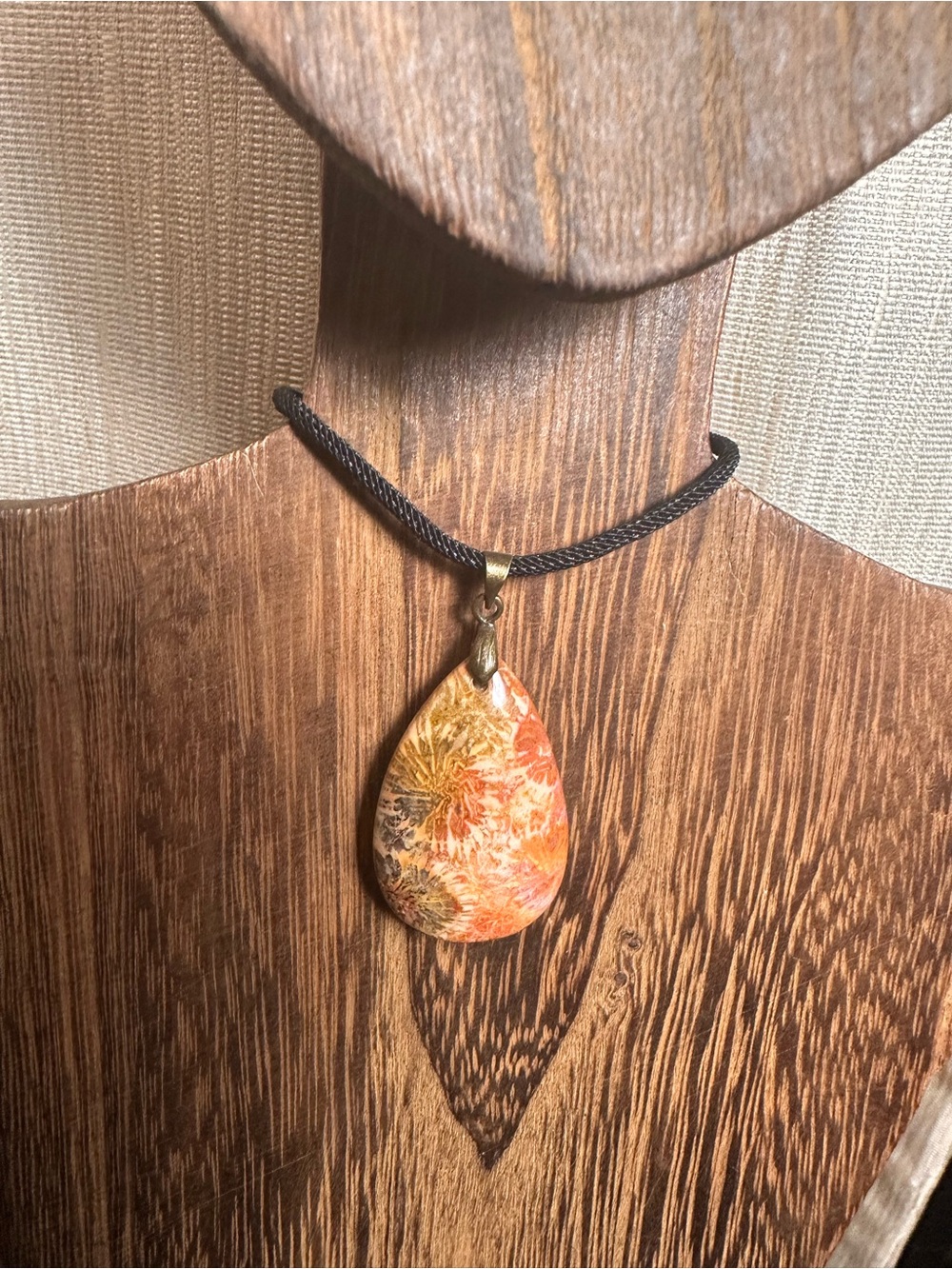 Orange and Black Coral Fossil Teardrop Pendant Necklace on Black Rope - Picture 3 of 16